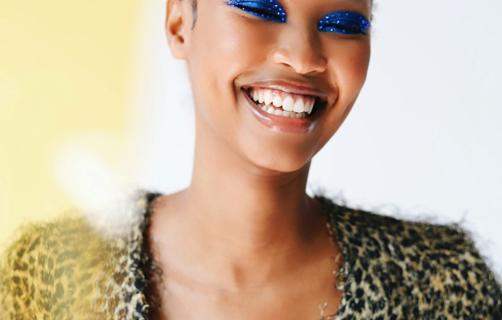 a south african black woman smiling